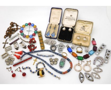 A collection of vintage costume jewellery, to include boxed earrings, buckles, dress clips and other items Condition Report:C