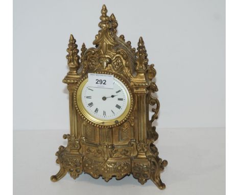 A cast brass mantle clock Condition Report:Available upon request
