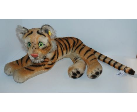 A modern Steiff tiger, 46cm long and a modern Steiff Husky, 54cm long (2) Condition Report:Available upon request