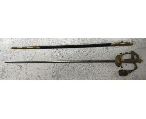 A Victorian officer's dress sword, the engraved blade with scrolling foliate decoration, inscribed "H Poole & Co. Saville Row