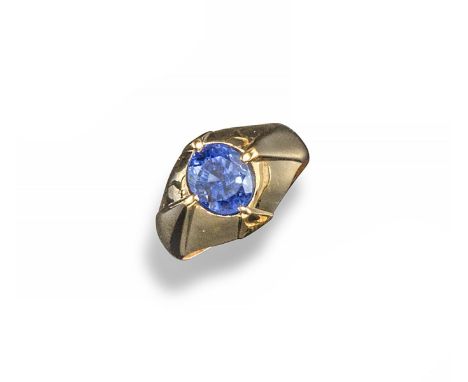 A sapphire solitaire ring, the oval shaped sapphire is set in yellow gold. Size K 1/2. Accompanied by report number 20023999 