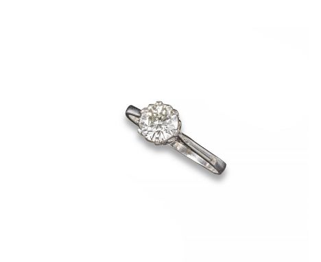 A diamond solitaire ring, the round brilliant-cut diamond weighs 1.07cts and is set in platinum. Size Q 1/2.  Accompanied by 