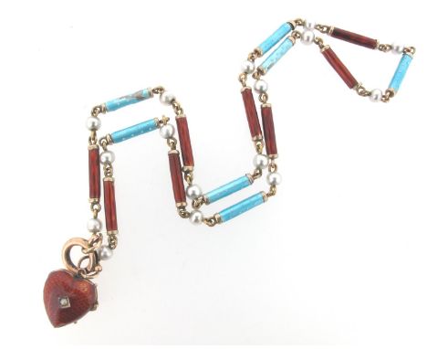 A gold and enamel necklace, set with alternating gold cylindrical links applied with red and blue enamel and suspending a red
