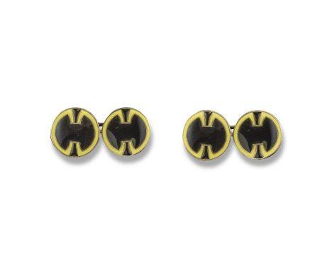 A pair of Art Deco French gold and enamel cufflinks, with yellow and black enamel decoration and French control marks. 1.4cm 
