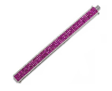 A ruby and diamond strap bracelet. Set with four rows of square-shaped rubies in white gold with pavé-set circular cut diamon
