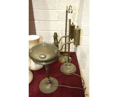A pair of brass student's lamps, (no shades), 53cm high and an Art Nouveau-style brass table lamp, 36cm high, (3). 