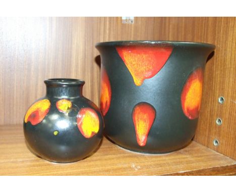 A Poole Pottery 'Galaxy' pattern jardiniere, 15cm high and a 'Galaxy' bud vase, in boxes, (2). 