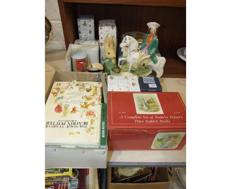 A collection of modern Beatrix Potter ceramic figures, children's books, a Staffordshire figure of Tom King and miscellaneous
