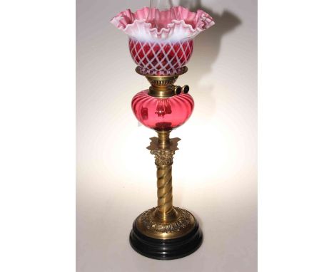 Victorian brass column oil lamp with ruby reservoir and fluted shade