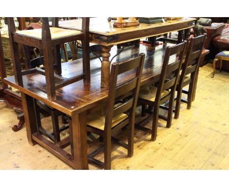 Large rectangular dining table and eight rush seated ladder back dining chairs (six single & two carvers)