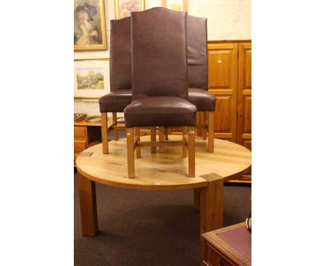 Large circular light oak dining table and three chairs