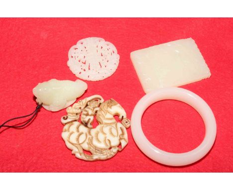 Chinese jade toad toggle; openwork toggle, bangle, rectangular plaque and an openwork toggle carved with horse, monkey and ba