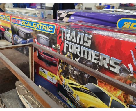 6 BOXED SCALEXTRIC MODEL SETS WITH TRANSFORMERS COMPRISING RALLY MINI, MICRO SCALEXTRIC NISSAN, AUDI, PORSCH ETC