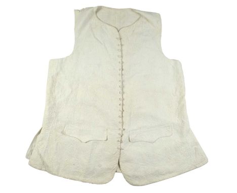 An 18th century gentleman's whitework waistcoat of fine corded quilting The fully quilted front of floral decoration with two