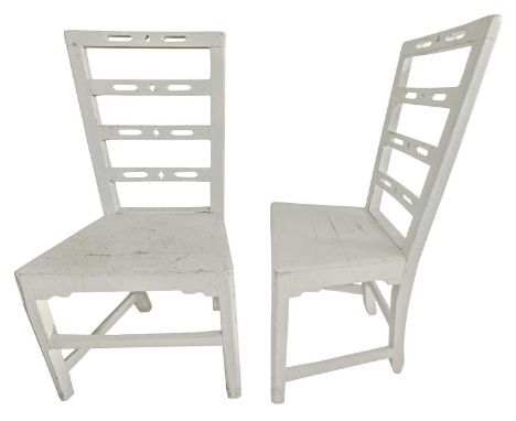 A Pair of Oak Chairs Painted white and with pierced ladder backs, in Chippendale gothic style.Height 95cm.