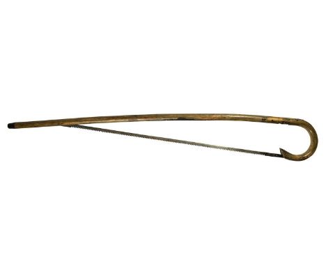 A gentleman gardener’s walking stick bow saw Of Holtzapffel type. The wooden stick, nickel mounted and with a silver shield e