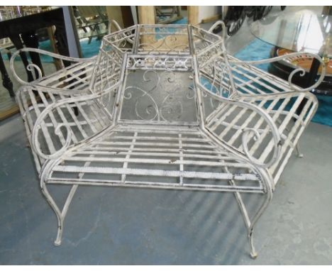 TREE BENCH, 19th century manner, wrought and cut metal of hexagonal form, approx 177cm diam.