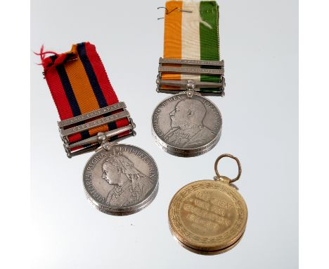 A Kings South Africa medal, with bars for 1901 and 1902, together with a Queens South Africa medal, with bars for Orange Free