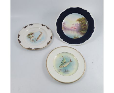 A Royal Worcester plate, painted with fish by Edward Salter, unsigned, dated 1897, together with a plate decorated with fish 