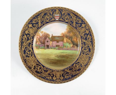 A Royal Worcester cabinet plate, printed and painted with a view of Sulgrave Manor by Evans, to a blue and gilt border, inscr
