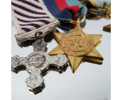 Two WW1 campaign medals, presented to 2.Lieut. R.G. Rowe, together with a page from the Berrow's Worcester Journal September 