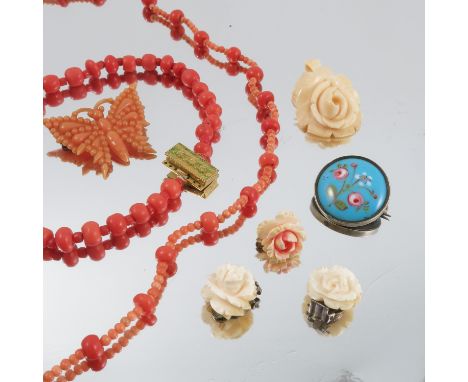 A quantity of jewellery, to include two coral necklaces, a silver hinged bangle and other items