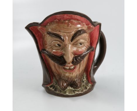 A Royal Doulton character jug, Mephistopheles, double sided portrait, printed verse to base, When the Devil was sick, the Dev