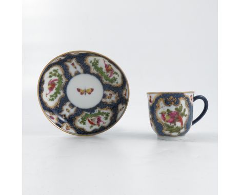 A Samson of Paris porcelain cup and saucer, decorated with reserves of fabulous birds and insects, mock Worcester seal mark t