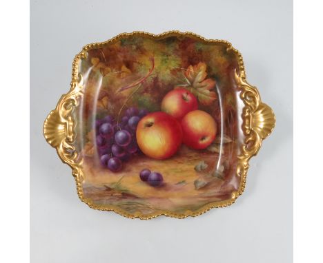 A Royal Worcester square dish, decorated with fruit to a mossy background by H H Price, to a shaped gilt edge and gilt shell 