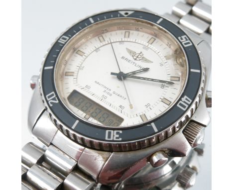 Breitling, Navitimer Quartz, the stainless steel case with white dial and luminous batons, hands and black sweep seconds, LCD