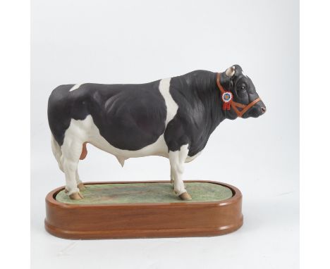 A Royal Worcester limited edition model, Fresian Bull, modelled by Doris Lindner, number 25/500, with plinth and certificateC