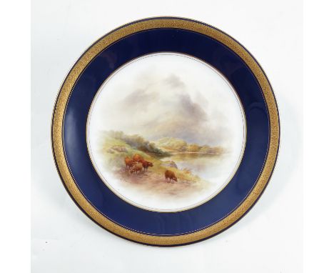 A Royal Worcester plate, decorated with Highland cattle by Stinton, with a blue and gilt border, diameter 9ins, circa 1912Con