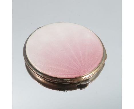 A silver and enamel powder compact, Birmingham 1939, of circular outline, fading pink guilloche enamel cover, 6.3cm diameter