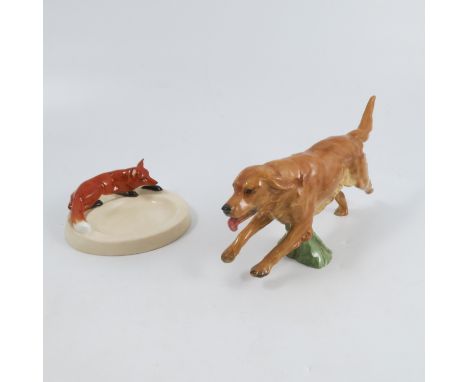 A Royal Worcester model, of a Golden Retriever running, shape 3309 dated 1951, together with a Royal Worcester fox ashtray, s