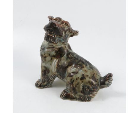 A Royal Copenhagen model, of a seated dog, in a brown glaze, by Knud Kyhn, factory mark and KK, height 6insCondition Report: 