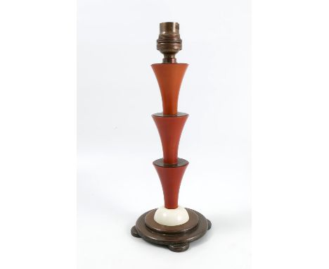 An Art Deco style lamp base, the column formed as three trumpets, raised on a stepped circular base, height 11insCondition Re