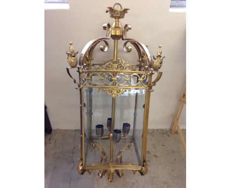 A large brass ceiling lantern.