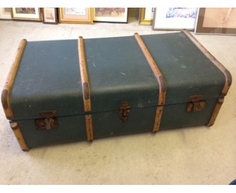 A vintage blue wooden banded trunk