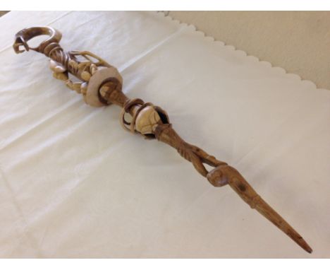 A South African tribal wooden 'Talking Stick' carved from a single piece of wood. 100cm long.Eagle ‘Semaphore’ Mikado extra t