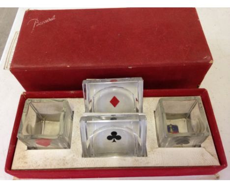 A c1950s boxed Baccarat glass playing card suit decorated dishes.