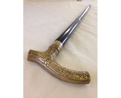 A brass handled ebony sectional walking stick.