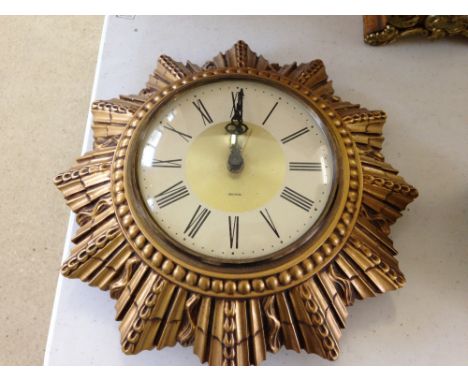 A Smiths Sectric clock in gilt sunburst mount.