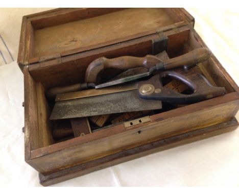 A vintage wooden toolbox and tools to include Spear & Jackson tenon saw, Marples chisel and other vintage tools.