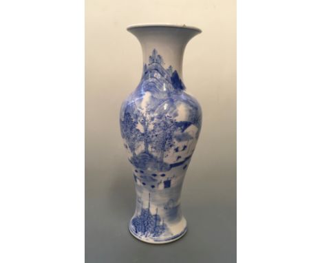 a Kangxi blue and white vase with mountain village scene, four character marks to base. Height 25.5cm.