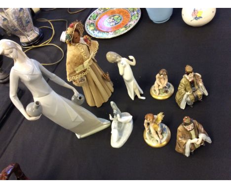 Eight figurines including Chinese, NAO female and ducks, cherubs, etc.