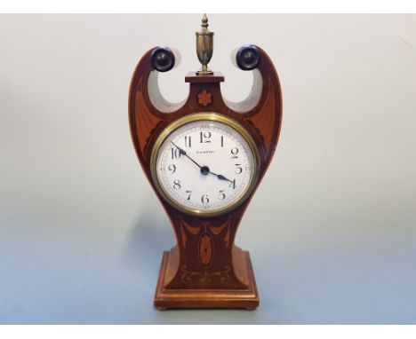 An Art Noveau mahogany inlaid cased mantle clock, white enamel dial name Elkington.