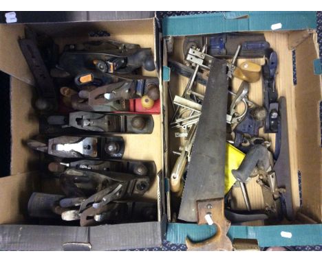 Three boxes of woodwork hand tools including saws, planes, etc.
