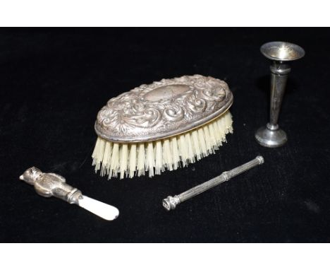 VARIOUS STERLING SILVER ITEMS Silver mounted scroll embossed hairbrush, small bud vase, monogrammed pencil (broken), bear sha