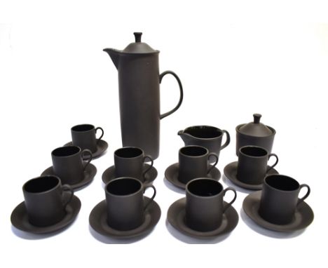 A WEDGWOOD BLACK BASALT COFFEE SERVICE  designed by Walter Robert Minkin, circa 1963, comprising totem cylindrical coffee pot