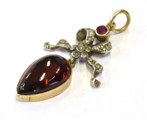 ANTIQUE FRENCH GEM SET PENDANT Featuring a pear shaped, cabochon pyrope garnet, approx 14.8 x 9.2mm, set in 9ct gold (tested)